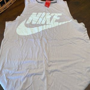 Women’s Nike sleeveless workout tank. Pale pink